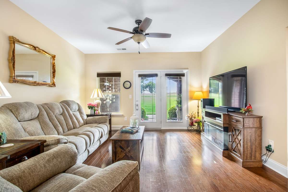 Comfy and Cozy... Filled with natural lighting that spills into the room..