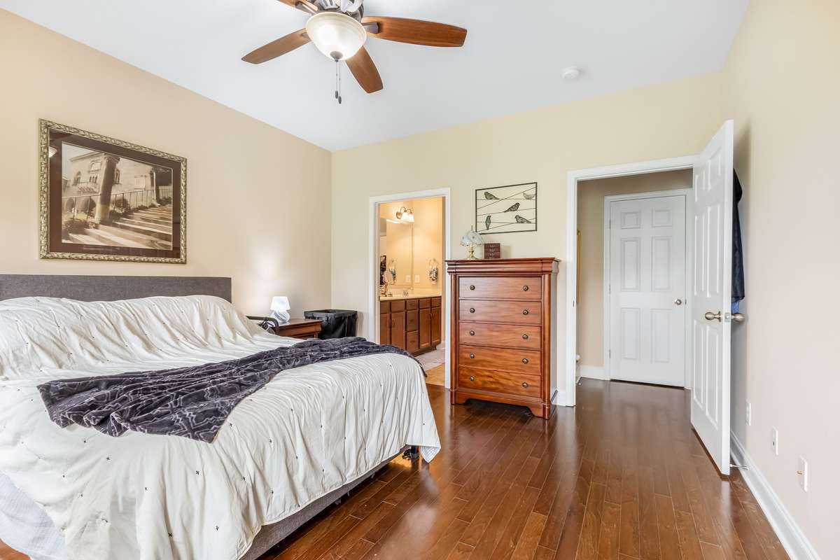 Enjoy the quiet comfort of single-level living with a primary suite that exudes effortless grace.
