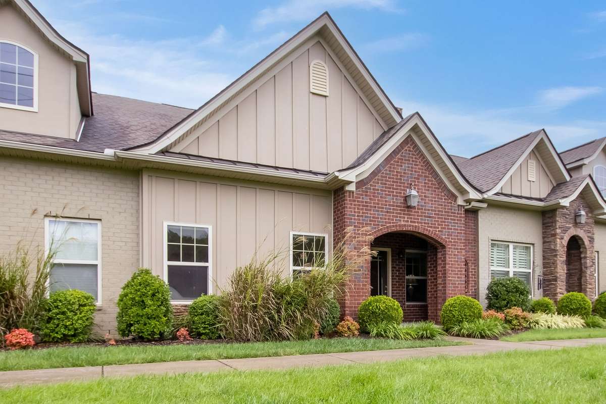 Step into timeless comfort and low-maintenance living in this beautifully designed cottage, where charm meets convenience.