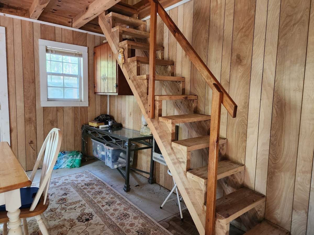 Stairs lead to second floor.