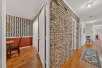 Right is hallway leading to the guest space. First door to the left of this hallway is the amazing pantry.