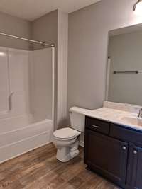 2nd tub with single vanity.