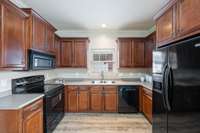 Stove, Microwave, Dishwasher, and Refrigerator convey