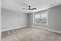 Oversized bedroom with attached full bathroom.