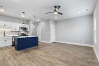 Kitchen island for additional seating & extra counter space.
