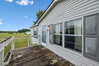 Front deck inviting you into the home.  1565 Eugene Reed Rd Woodbury TN 37190