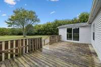 Large back deck is perfect for a patio set.  1565 Eugene Reed Rd Woodbury TN 37190