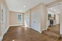 And here it is…the totally redesigned den. Just 2 steps down from the kitchen, this is where cosy nights watching your favorite TV programs or watching exciting games with friends and family.