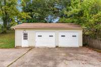 The 2 car detached garage with pedestrian door.