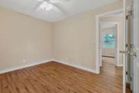 Another view of the primary bedroom.