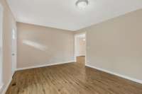 Very tasteful choices with the floor and coordinating wall color.  All trim is bright white and all ceilings are bright white.