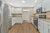 Completely redesigned kitchen with new layout.  We added plenty of drawers for storage.