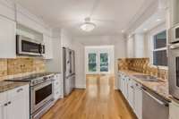 Beautiful kitchen. Appliances remain