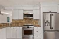 Granite counters & tiled backsplash