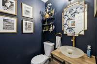 Newly updated half bathroom features a custom, one of a kind sink, by a glass artist in Portland, OR.