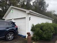 Detached 2 car garage; manual doors; with storage