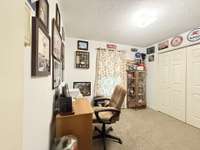 3rd Bedroom/Office overlooking front yard with large closet