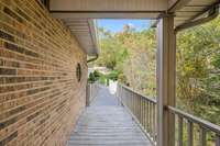 View from front door, looking back at driveway entrance.
