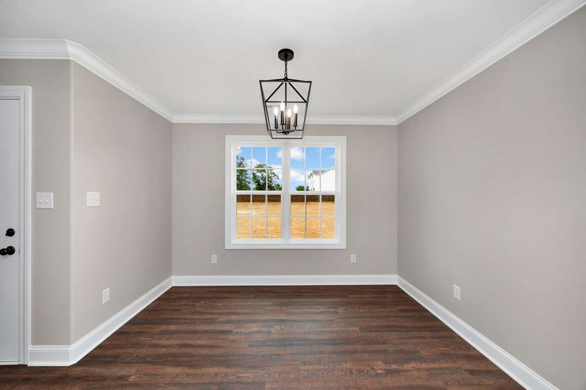 Dining Room- LVP flooring, crown molding