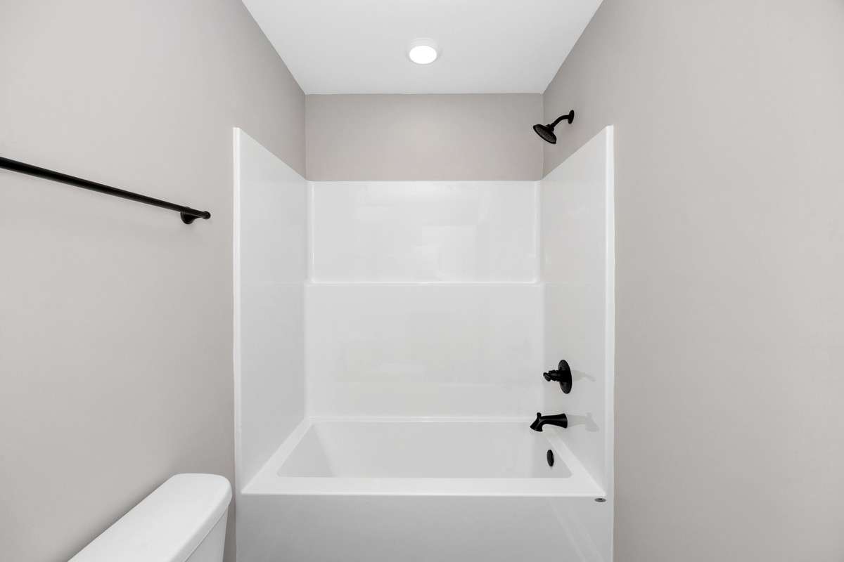 Full Bath- LVP flooring, tub/shower combo