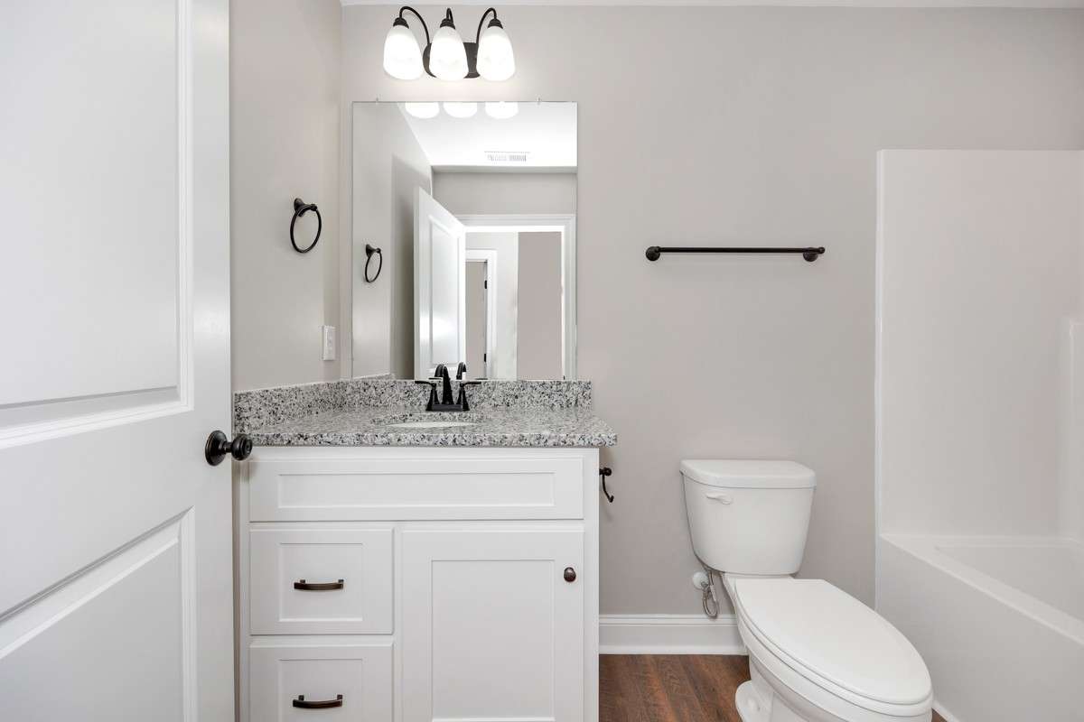 Full Bath- LVP flooring, tub/shower combo