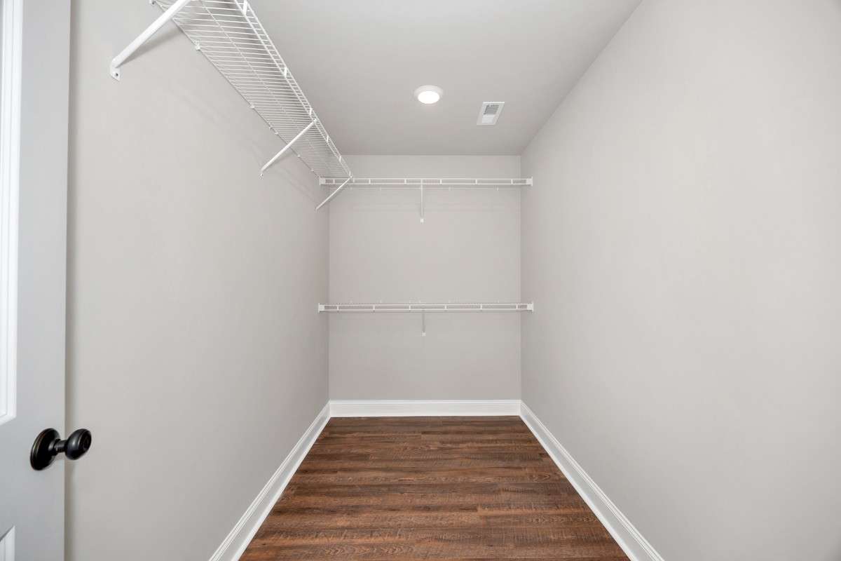 Walk-In closet- LVP flooring, wire shelving