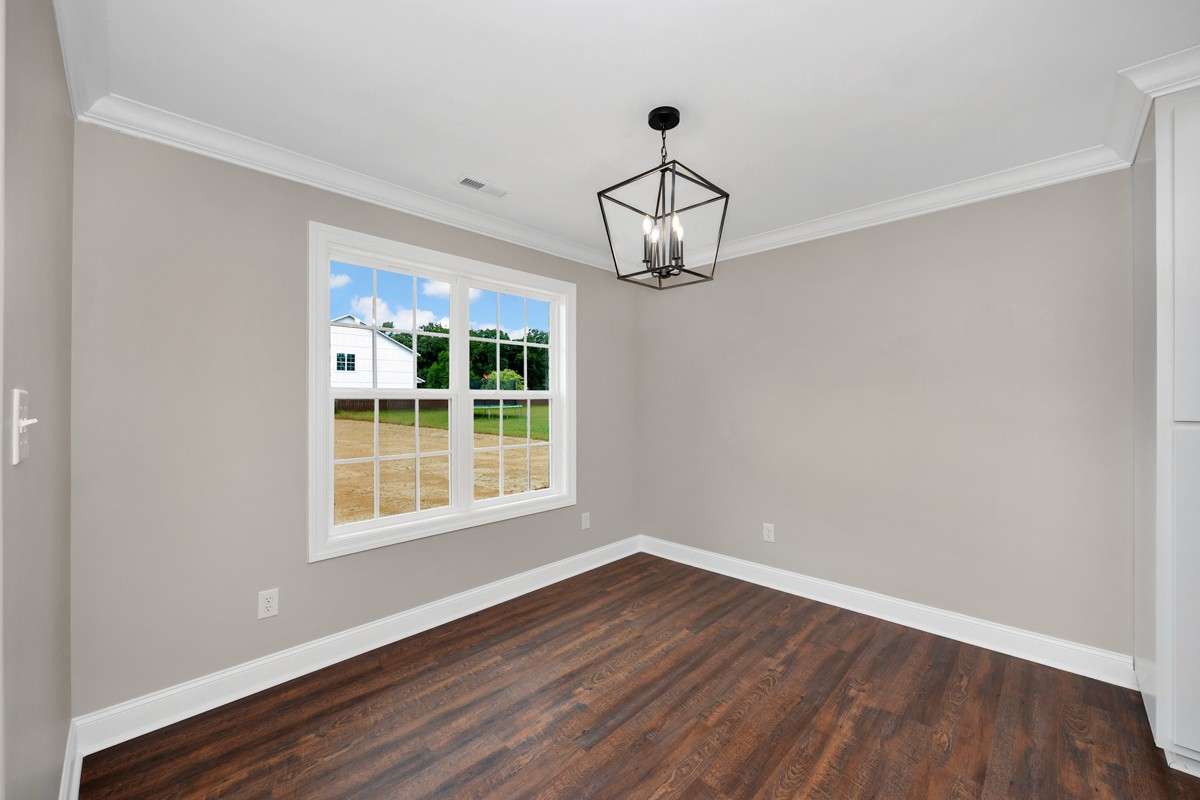 Dining Room- LVP flooring, crown molding