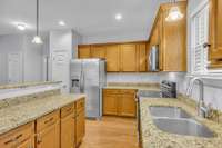 The new refrigerator remains with the house