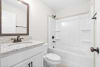 Example Photos, colors and materials may vary