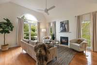 The property features vaulted ceilings and a gas burning fireplace