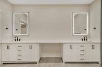 Owners Bathroom with His & Her Vanities