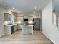 Kitchen.

*Photos are from a staged model home of floor plan. Options and Selections may vary in actual home.