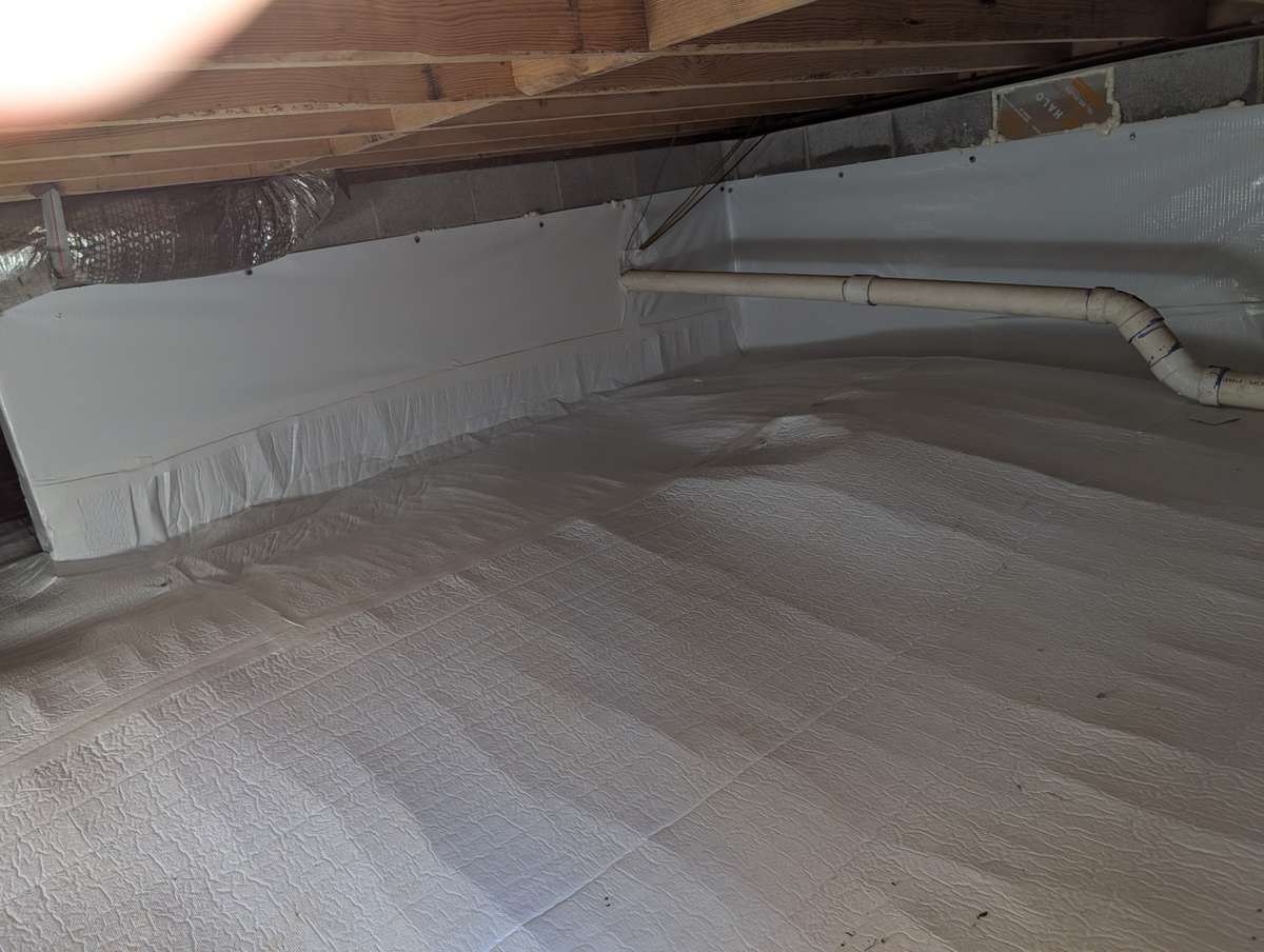 Encapsulated crawl space prevents damp earth smells rising into the living space and it makes the home more energy-efficient.