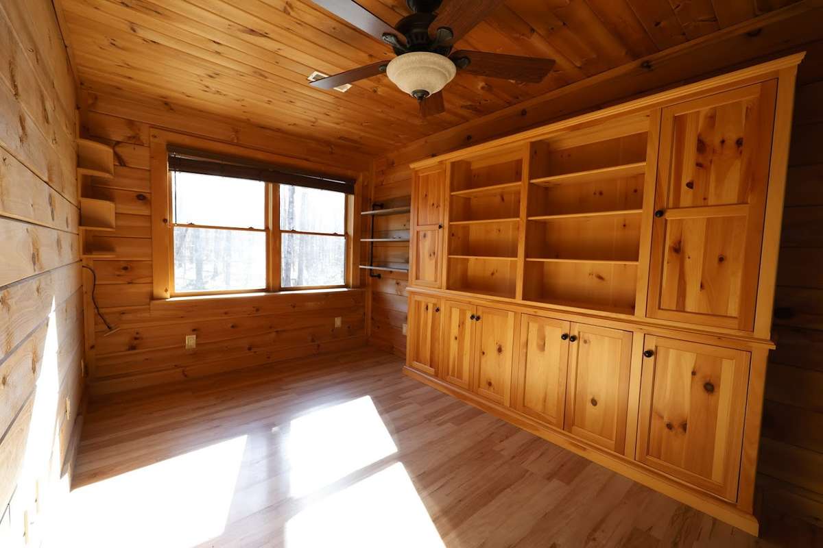 Built in bookshelf a major feature of the open flex room on second floor