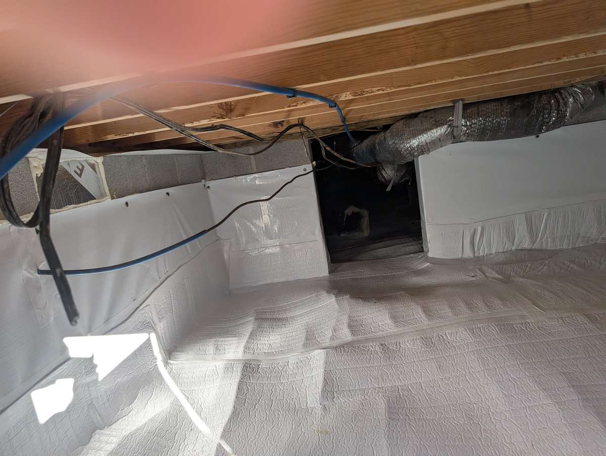 Crawl space has been encapsulated with a vapor barrier of thick plastic, vents have been sealed, dehumidifier has been installed.