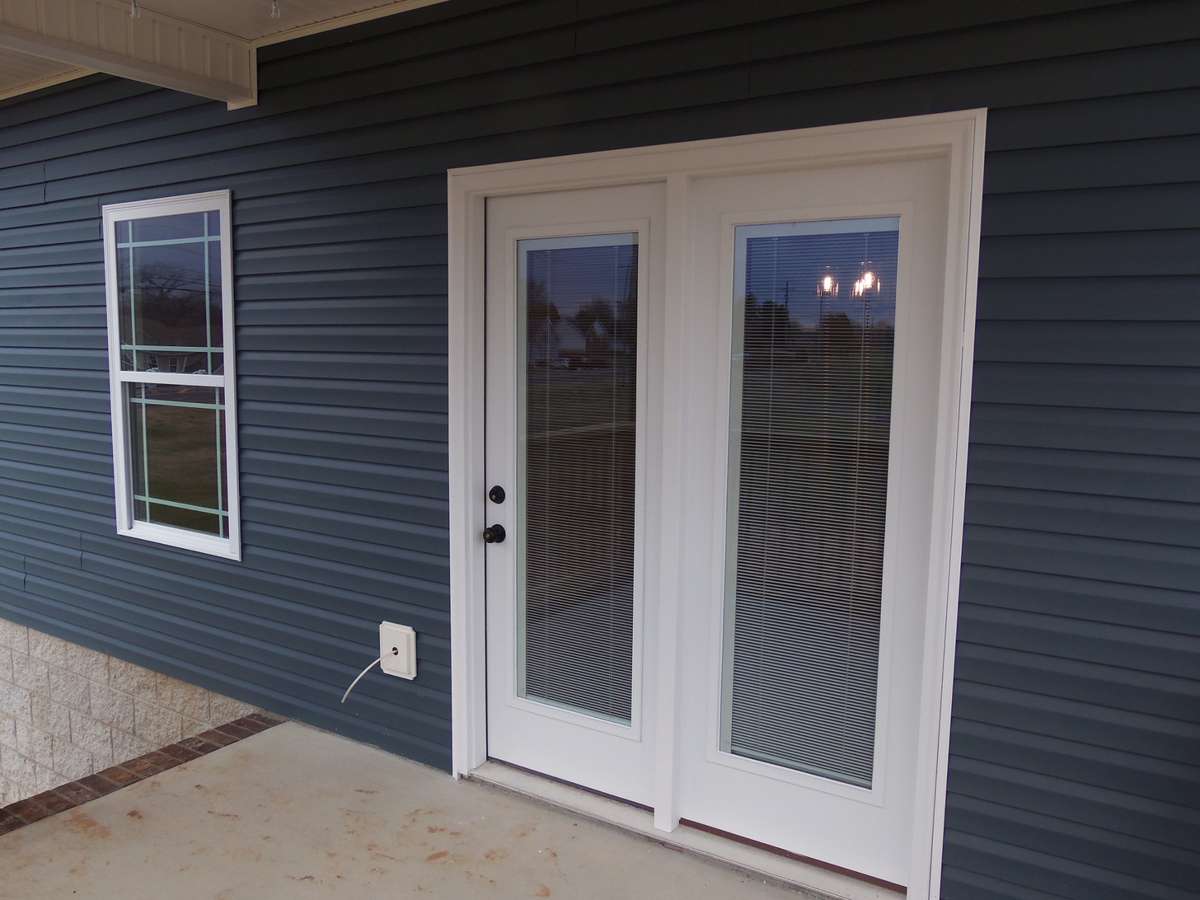 Deck with blinds between the glass.
