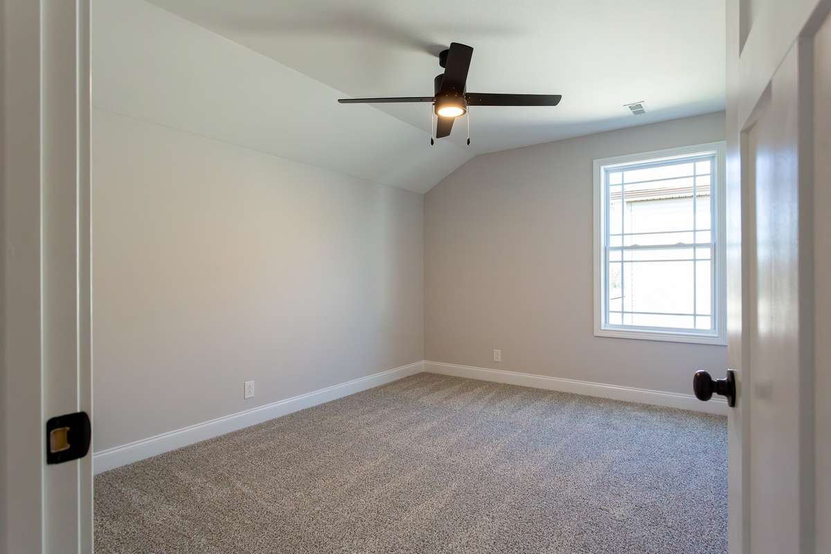 Third bedroom upstairs bedroom with walk-in closet.