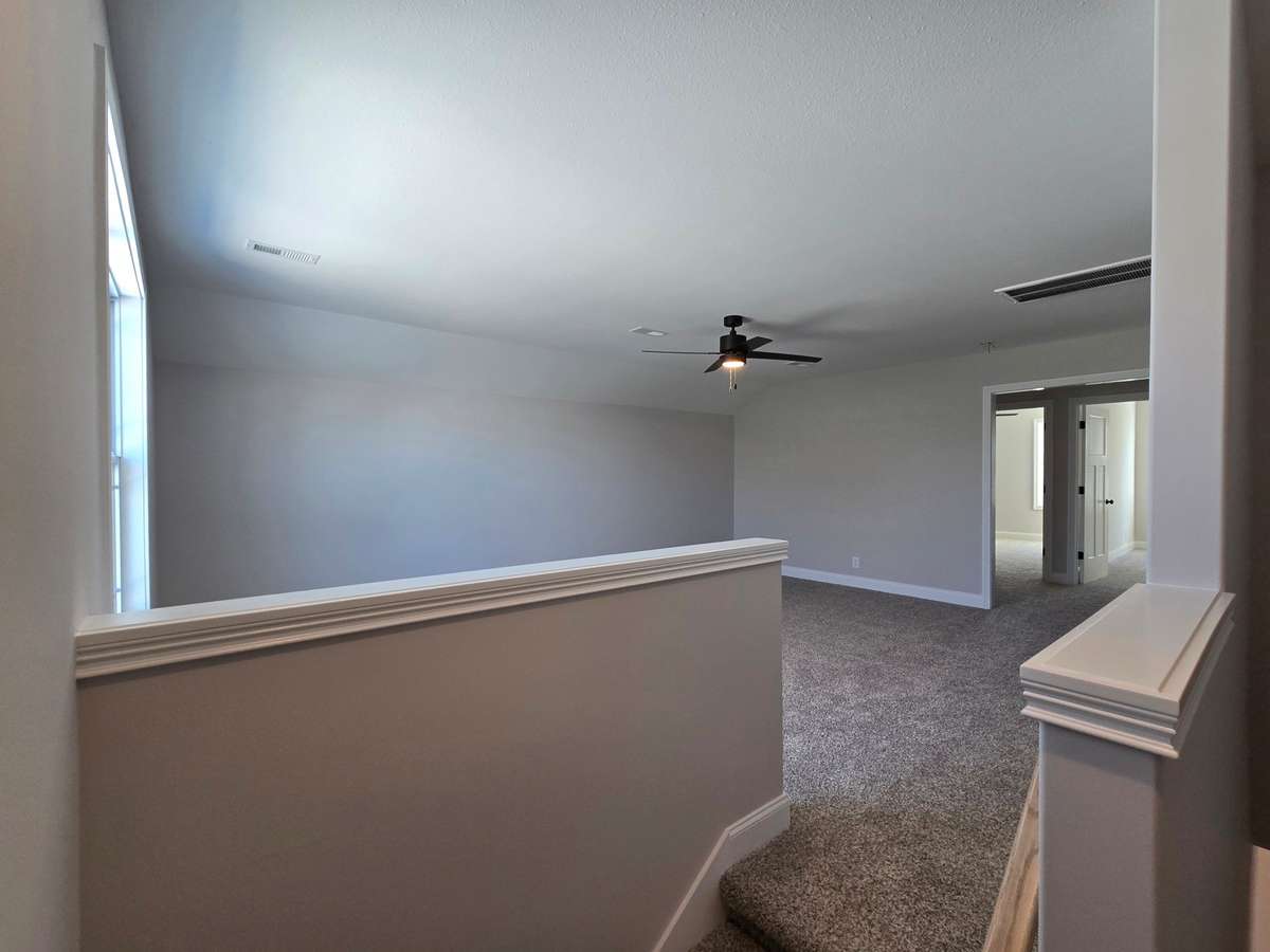 Bonus room with 2 bedrooms a full bathroom and plenty of storage.