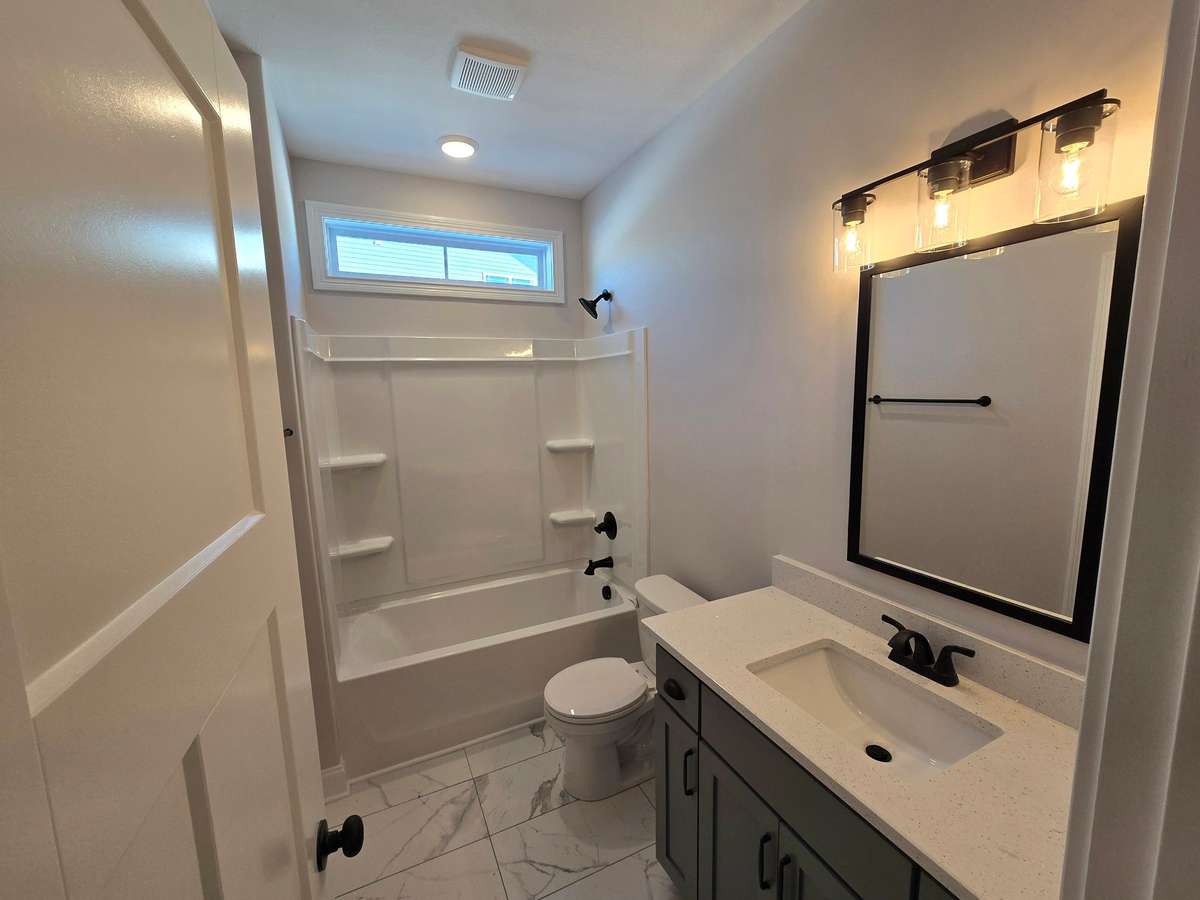 Guest bathroom which also leads into 2nd bedroom.