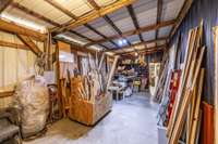 Carport converted into shop storage area