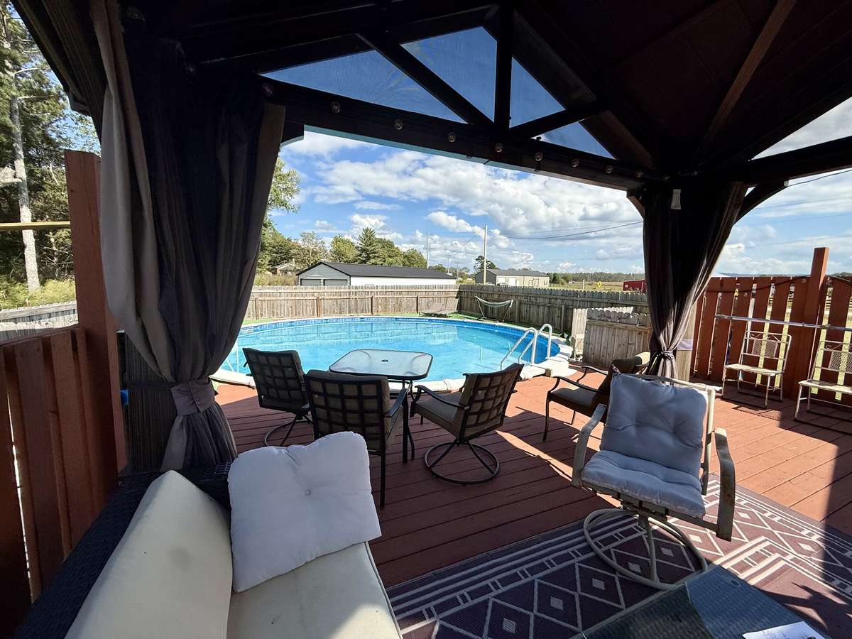 Lounge by the pool in the shade.