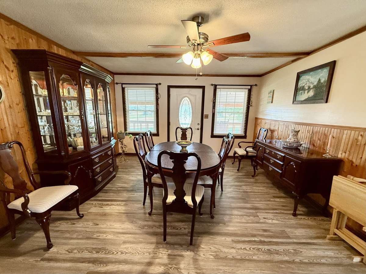 This view is from the Seating area at Fireplace and is part of the Living Room which is being used for Formal Dining.