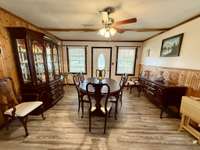 This view is from the Seating area at Fireplace and is part of the Living Room which is being used for Formal Dining.