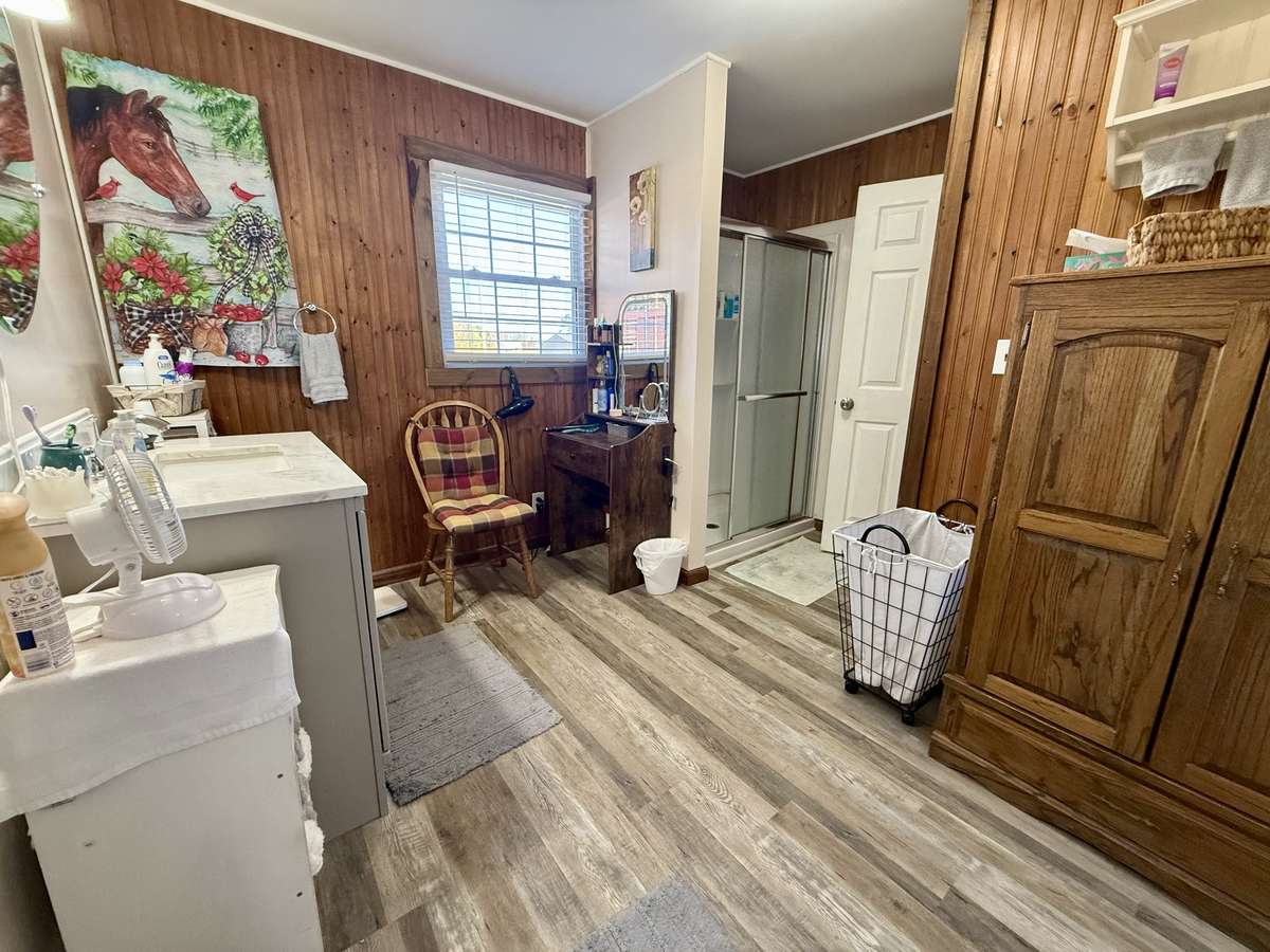 Bath 1 - This Bathroom features a closet and adjacent to BDR 1.