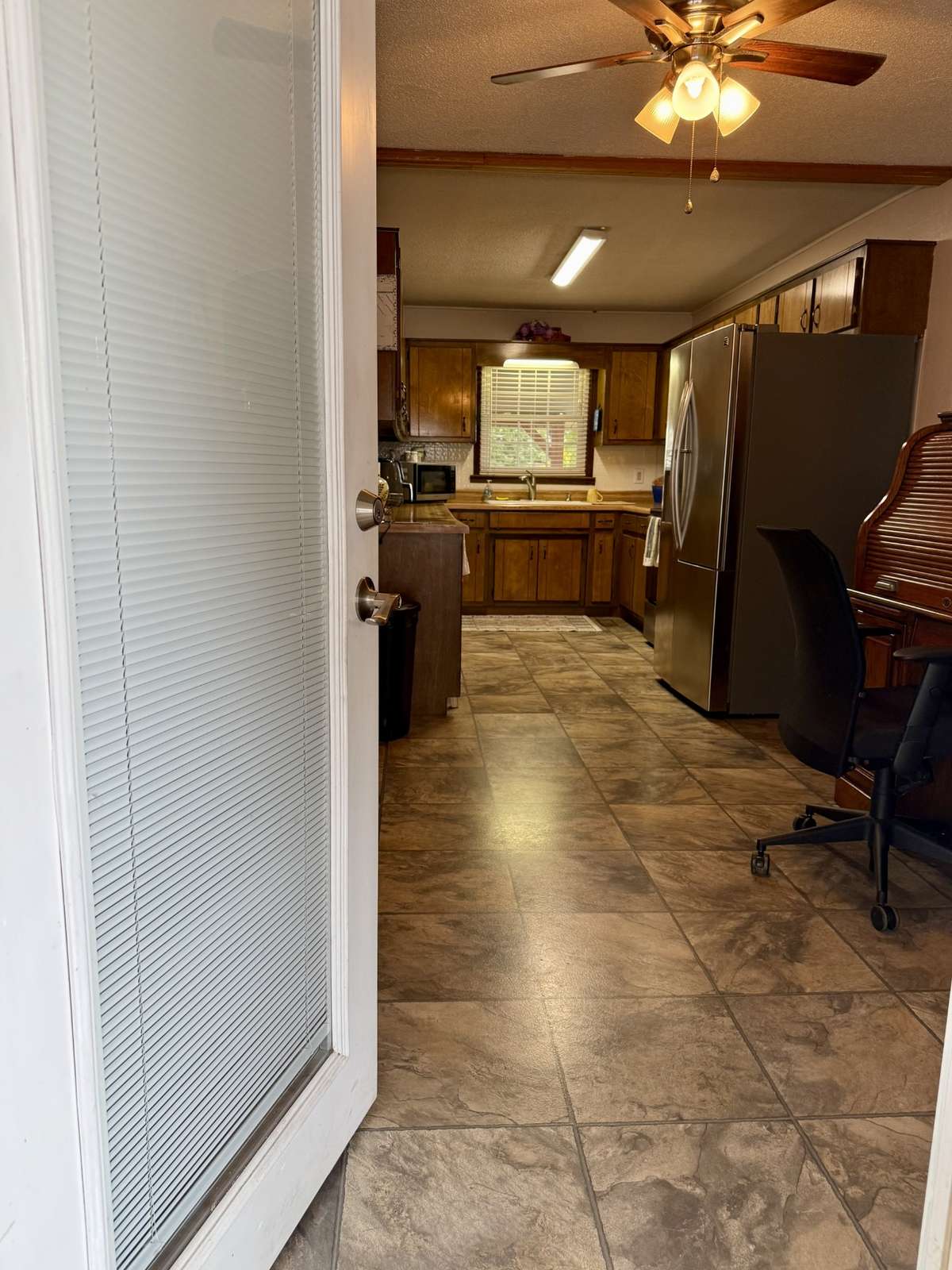Rear Entry into the Dining/Kitchen Combo. Measures 9'x23'
