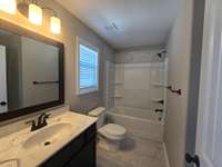 Jack n Jill Bathroom located between Bedroom 3 and 4