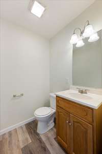 Half Bathroom off the living room perfect for guests and entertaining!