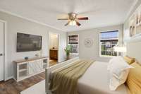 A spacious primary bedroom offering a serene retreat with abundant natural light and a relaxing, private atmosphere.