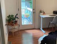 Bedroom 3 that opens to the deck and spacious backyard