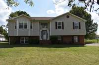 Three Bedrooms with Three Full Baths... Possible 4th Bedroom in the Basement with Full Bath.